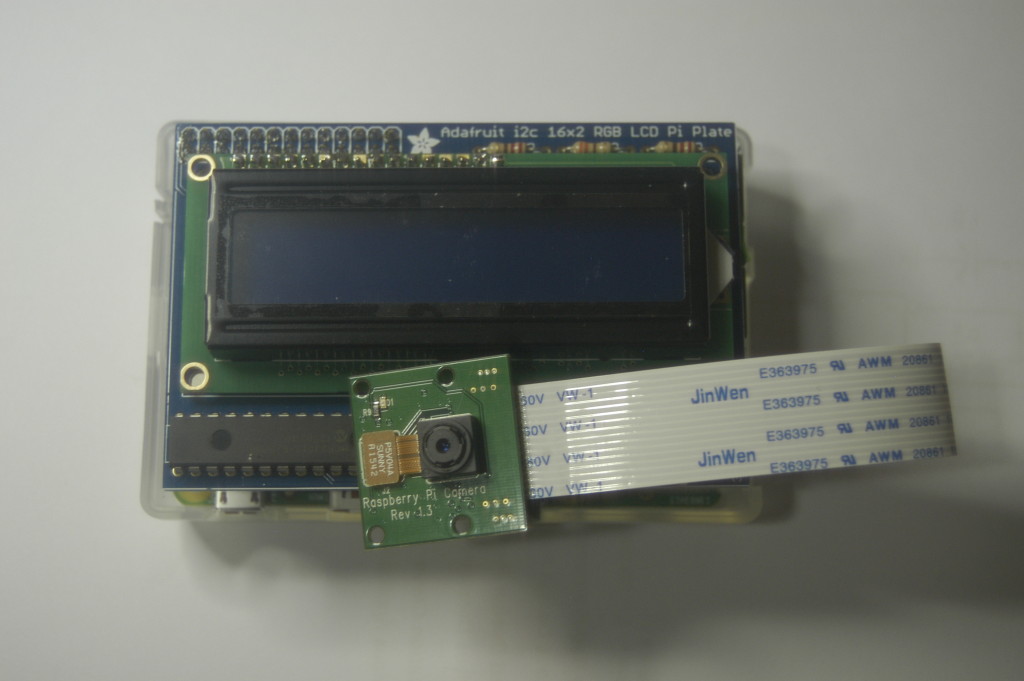 Raspberry Pi camera module attached to Pi with LCD display